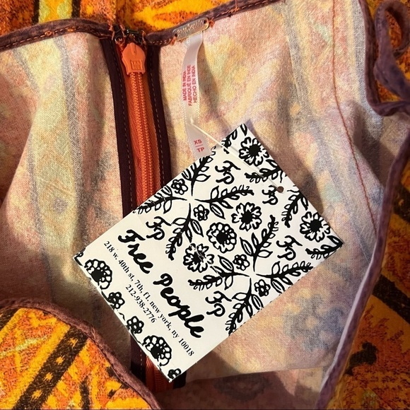 NWT FREE PEOPLE Woodblock Design Print Faux Wrap Tie Side Mini Skirt Size XS - Picture 11 of 14